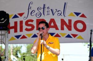 Maxima 95.3 broadcaster and event co-organizer Kevin Andrade welcomes the crowd Sunday, Sept. 17, to Festival Hispano 2017 in Georgetown.