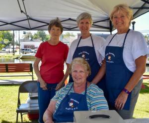 Working the Goshen UMC's Holy Smokers tent are (l-r) Joan Yunger, Donna Reid, Gerri Warrington and Jan Carey, in front.