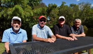 Relaxing to some country and bluegrass are (l-r) Bill Kennerly of Annapolis, Bob Hauck of Millsboro, Jack Boyd of Arnold, Md., and Dit Weiss of Arnold, Md.