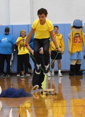 Class of 2019 representative Nick Mueller fights for his class in the relay race.