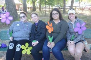 The Neurology Center of Southern Delaware team takes a seat before the walk. Shown are (l-r) Casandra Baker, Chelsea Birch, Mariah Brown and Staci Cahall. Alzheimers walk