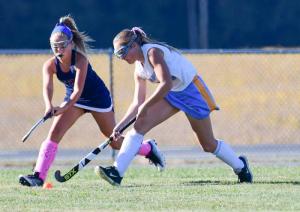 Beacon’s Lauryn Head, right, battles for possession along the endline with Sussex Academy’s Josie Martin.