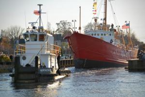 With a large crowd watching, Overfalls leaves for its journey to New Jersey for repairs. RON MACARTHUR PHOTO