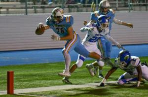 Cape senior fullback Ben Ashby dives for the end zone, but was called out of bounds on the 3-yard line.