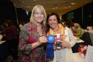 Happy with their first place in the cookie division are Darlene Gaffney, left, and owner of Peanut Butter Dream cookies Lisa Semler from Annapolis, Md. Chocolate Festival