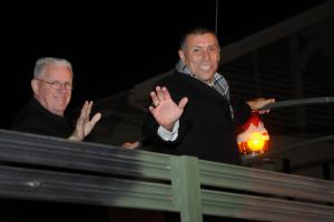 Representatives Harvey Kenton, R-Milford, left, and Steve Smyk, R-Milton, wave to the crowd along the parade route. BY DAN COOK