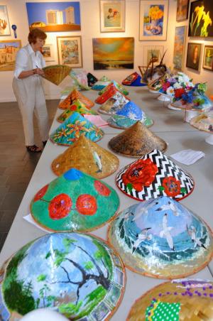 Local artists are submitting painted hats as part of a 75th anniversary celebration contest. They are the type of hats worn by Rehoboth Art League founder Louise Chambers Corkran. BY RON MACARTHUR