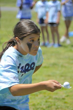 Anna Stancofski has her eyes set on the finish line as she keeps a golf ball from dropping. BY RON MACARTHUR