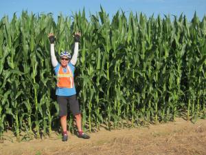Becky shows the height of the Illinois corn, mid-July. I'm hearing that with all the rain this summer on Delmarva, the corn there has never been taller.