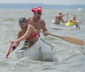 Emily Williams and Chad Jenkins concentrate on paddling the Pirates Booty canoe homeward without taking on water. BY DENY HOWETH