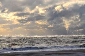 High wind and waves, clouds and frigid temperatures combine to create a surreal look along the coast. BY RON MACARTHUR