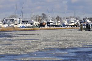 Ice chunks on Lewes-Rehoboth Canal are driven by wind and tide along Pilottown Road in Lewes. BY RON MACARTHUR