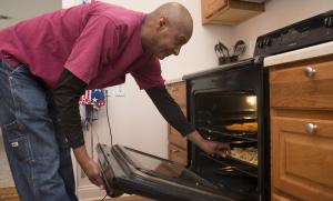 Freddie Doughty works at the day shelter and makes light meals for those who come in from the cold. BY DENY HOWETH