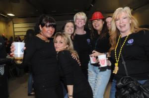 The ladies from the Village Salon and Spa enjoy the feast as a company. Shown are (l-r) Rachel Murray, Karen Smith, Raven Hudson, Lucy Ghigliotty, Debbie Messick, Nelma Aiello and Janice Pruskiewicz. BY STEVEN BILLUPS