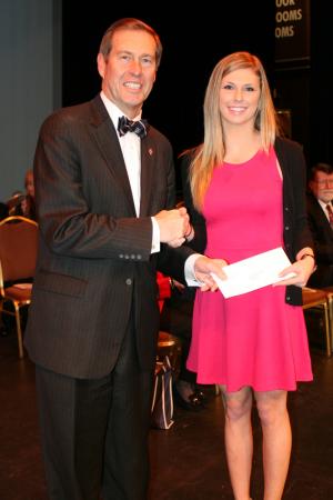 Megan Albano, a senior business administration major from Milton, received a scholarship at Wesley College's Founders Day March 19. The Richard Paul Pepper Memorial Scholarship was established in 1983 by family and friends of Pepper, who was a student at Wesley until his untimely death in 1983. This scholarship provides financial assistance to a worthy student. Wesley College President Dr. William N. Johnston congratulates Albano. SOURCE SUBMITTED