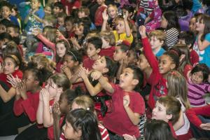 Students get excited watching the fifth-graders dance to "Thriller" by Michael Jackson. BY DENY HOWETH