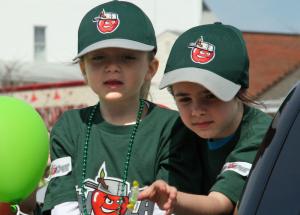 Kali Pennington, left, and Stephanie Travis throw candy to the on lookers during Saturdays Rehoboth Little League Parade. BY PAT IRELAN