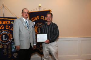 Lewes Mayor Jim Ford was presented with a Certificate of Appreciation for his 22 years of public service, the last 10 as mayor of Lewes. Shown are King Lion Pete Dirks, left, and Ford. BY STEVEN BILLUPS