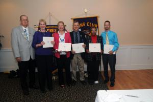 The Lions Club presented the Delaware Lions Foundation Ralph Helms Fellowship to five club members. Shown are (l-r) King Lion Pete Dirks and Ralph Helms with fellowship recipients Natalie Popham, Beth Hicks, Gavin Braithwaite, Liz Brittingham and Chris Russ.