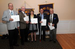 The Delaware Lions Foundation awarded the James McCarty Fellowship Award to (l-r) Pete Dirks, Charles Worthan, Nancy Russ, Lloyd Schmitz and Joe Melchiorre. BY STEVEN BILLUPS