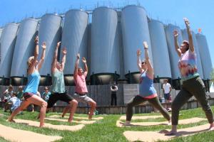 Inviting in good spirits are yogis (l-r) Lisa Willey, Michael Willey, Chris Willey, Lindsay Falkowski and Donna Fisher. Chris Willey is the owner of Yolo Mats in Ocean City, Md., which offers handmade yoga mats. BY DAREN CRISWELL