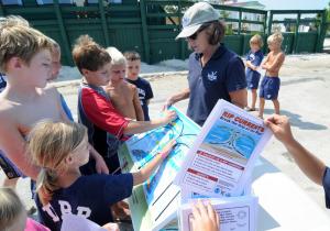 Sea Grant coastal hazards and resiliency specialist Wendy Carey explains how to escape the danger of a rip current. BY DAN COOK