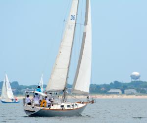 With Lewes Beach in the background, Lewes boat Mahal sails in the annual Cape-to-Cape Challenge. The boat finished third overall in the non-spinnaker class. BY RON MACARTHUR