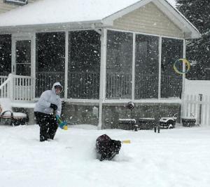 Terry Daleiden and Zoe Ellendale play with the HurriK9, a dog toy. JESS DALEIDEN PHOTO