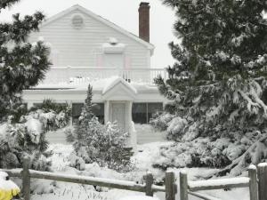 Snow makes this house in Indian Beach look like a postcard. ROSE KARAKA PHOTO
