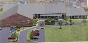 This is an artist’s rendering of what the proposed Gateway Motion and Fitness complex would like look. The Villages East community is situated at the rear of the building,