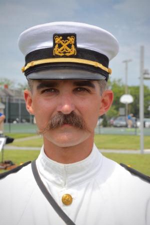 Luke Clawson of Wilmington shows how a U.S. Navy warrant officer would have dressed during World War I. RON MACARTHUR PHOTO