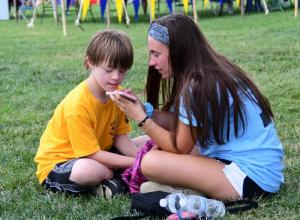 Ambassador Megan Lynch, right, of Concord shares a fun app with her buddy Matthew Ray. DAN COOK PHOTO