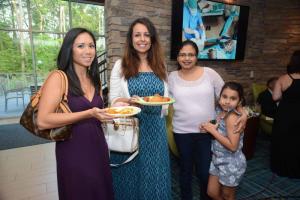 Helping to support the funding of the e-learning grant are (l-r) Dawn Dillon, Dawn Adili-Khams, Sravanthy Pataparla and Arni Pataparla. Lewes-Rehoboth Rotary
