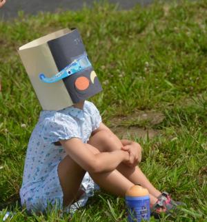Julia Chahalis of Silver Spring, Md., should win an award for the most unique eclipse glasses. RON MACARTHUR PHOTO