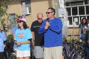 Sen. Ernie Lopez, R-Lewes, a native of Puerto Rico, talked to the gathered crowd and racers about the situation following the hurricane. Event organizer Rehoboth Commissioner Kathy McGuiness and Rep. Pete Schwartzkopf, D-Rehoboth Beach, joined Lopez during the talk.