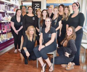 Village Salon & Spa employees donated their time for the service-a-thon. Shown in back are (l-r) Corey Mege, Ambre Jones, Marquita Herrera, Kathleen Williams, Haley Lohrfink, Jenna Maloney, Logan Shubert, Gina DiNubile, Raven Hudson and Chelsea Dengler. In front are Karen Smith, Jen Mihalik and Alicia Hadder.