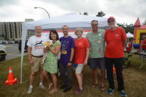 Officials turned out for the family-friendly event. Shown are (l-r) Rehoboth Beach commissioners Stan Mills and Kathy McGuiness, SPCA Director of Operations Walt Fenstermacher, Rehoboth Beach Commissioner Lisa Schlosser, Sen. Ernie Lopez, R-Lewes, and volunteer Richard Byrne. McGuiness is holding puppy Zack, who is up for adoption. Bark on the Boards