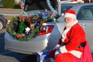 What season is it? Santa Claus opens his trunk to hand out candy during the Sussex Family YMCA’s fall fun event. RON MACARTHUR PHOTO