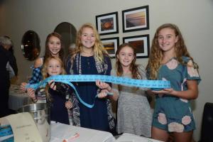 Working together selling 50/50 tickets are (l-r) Lindsay D’Ambrogi, Mairead Rishko, Kelly Bragg, and Lulu and Ella Rishko. SoDel Cares Fundraiser