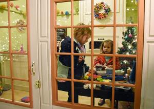 Kinsley Daniel, 5, and her sister Brielle, 2, play in one of the many mini homes in Schellville. NICK ROTH PHOTO