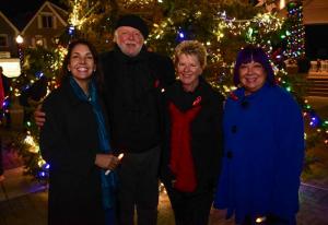 Receiving their candles at the pre-walk ceremony are (l-r) Kathy McGuiness, Russell Stiles, Kathy Wiz and Patricia Stiles.