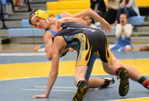 Mariner’s George Delgaudio headhunts and gets the pin over Beacon’s Joe McLean in the 118-pound class.
