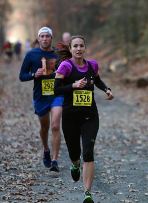 Dani Digennaro of Wilmington leads a pack toward Wolf Neck Road. She finished with a time of 1:37:02.9. DAN COOK PHOTO
