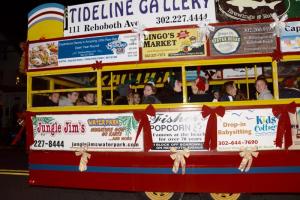 Jolly Trolly provides a ride to Beacon Middle School Jr. Honor Society members as they sing Christmas songs. The group won honorable mention.
