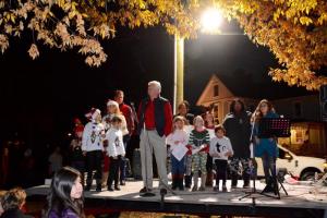 Lewes Mayor Ted Becker starts off a tree-lighting ceremony and caroling following the parade in Zwannendael Park.