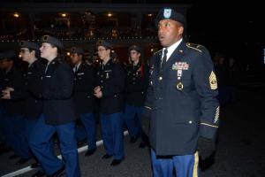First Sgt. Timothy Spencer calls out the cadence for the Sussex Tech JROTC Raven Battalion. The battalion placed second in the Adult/Youth Marching or Walking Group. Georgetown Christmas Parade