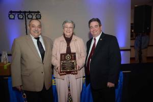 Caddie Ann Joseph, center, received a special recognition award for her many years of dedication and commitment to Station 82 involving fire prevention, scholarships, Blood Bank and ambulance service. Shown are (l-r) Past President Eddie Schaeffer, Joseph and President Charlie Arnold.