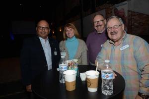 Socializing at the event are (l-r) panelist Dr. Uday Jani, high school counselor at G.W. Carver Academy and panelist Whitney Price, Dan Gagano and Kenn Kaye. CFFDE