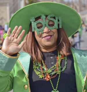 Katrina Wilkerson waves from behind Irish glasses.