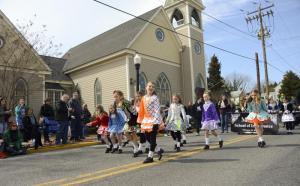 Dancers from the McAleer School of Irish Dance prance down Union Street.